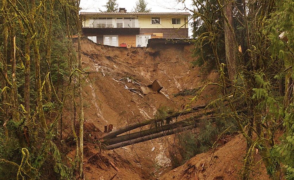 Aftermath of a deadly debris flow in the Riverside Drive area of North Vancouver in January, 2005. _Source: The Province (2005), used with permission._