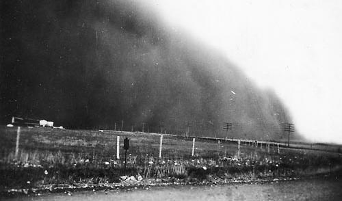 Wind transports sediment in a dust storm near Okotoks, Alberta, Canada in July of 1933. _Source: Glenbow Museum Archives, File Number NA-2199-1 (1933) Public Domain [view source](http://ww2.glenbow.org/search/archivesPhotosResults.aspx?AC=GET_RECORD&amp;XC=/search/archivesPhotosResults.aspx&amp;BU=&amp;TN=IMAGEBAN&amp;SN=AUTO22774&amp;SE=1569&amp;RN=0&amp;MR=10&amp;TR=0&amp;TX=1000&amp;ES=0&amp;CS=0&amp;XP=&amp;RF=WebResults&amp;EF=&amp;DF=WebResultsDetails&amp;RL=0&amp;EL=0&amp;DL=0&amp;NP=255&amp;ID=&amp;MF=WPEngMsg.ini&amp;MQ=&amp;TI=0&amp;DT=&amp;ST=0&amp;IR=27264&amp;NR=0&amp;NB=0&amp;SV=0&amp;BG=&amp;FG=&amp;QS=ArchivesPhotosSearch&amp;OEX=ISO-8859-1&amp;OEH=ISO-8859-1)_