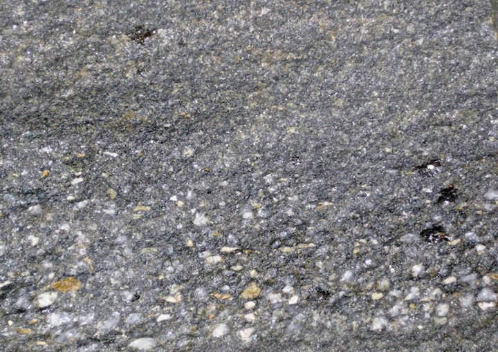 Graded bedding going from pebbles at the bottom to sand at the top. _Source: Cropped from James St. John (2018) CC BY 2.0 [view source](https://flic.kr/p/25m1kaG)_