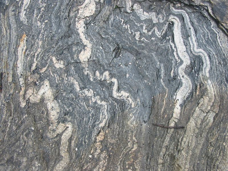 Migmatite photographed near Geirangerfjord in Norway. _Source: Siim Sepp (2006) CC BY-SA 3.0 [view source](https://commons.wikimedia.org/wiki/File:Migma_ss_2006.jpg)_