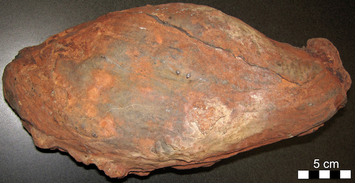 Volcanic bomb with a streamlined shape. _Source: James St. John (2016) CC BY 2.0 (scale added) [view source](https://flic.kr/p/PdzxtC)_