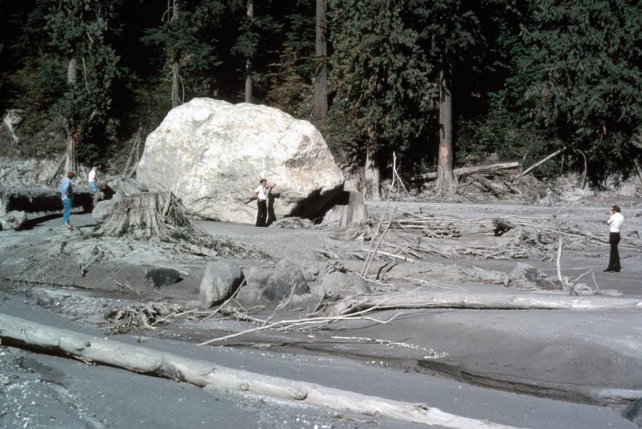 Mud left behind from the lahar after the May 18, 1980 eruption of Mt. St. Helens. The lahar carried the boulder to its present location. _Source: L. Topinka, U. S. Geological Survey (1980) Public Domain [view source](https://volcanoes.usgs.gov/vsc/images/image_mngr/1100-1199/img1107.jpg)_