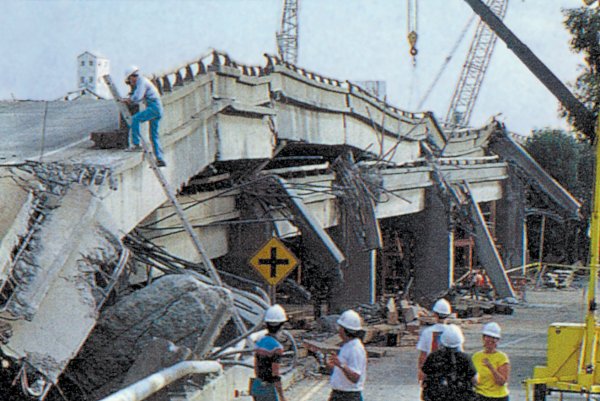 A collapsed section of the Cypress Freeway in Oakland California. _Source: U. S. Geological Survey (1989) Public Domain [view source](https://commons.wikimedia.org/wiki/File:Cypress_collapsed.jpg)_