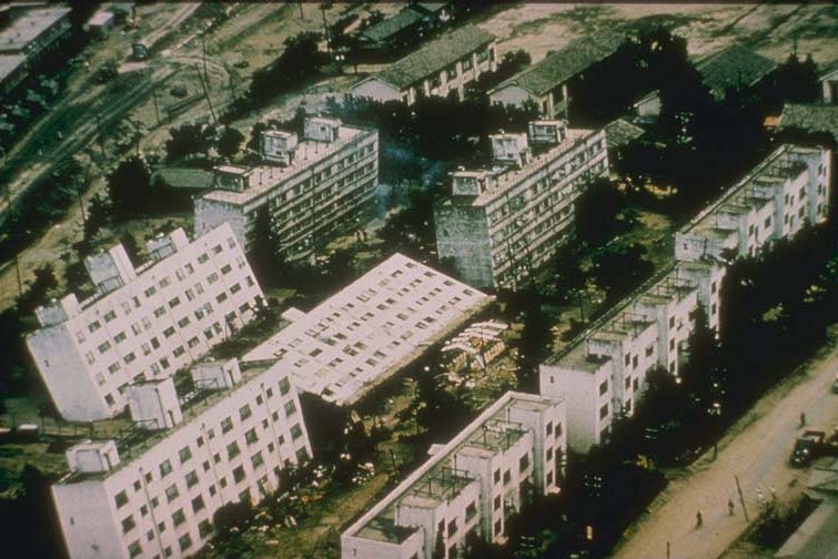 Collapsed apartment buildings in the Niigata area of Japan. The material beneath the buildings was liquefied by the 1964 earthquake. _Source: DOC/NOAA/NESDIS/NCEI (1964) Public Domain [view source](https://catalog.data.gov/dataset/1964-niigata-japan-images)_