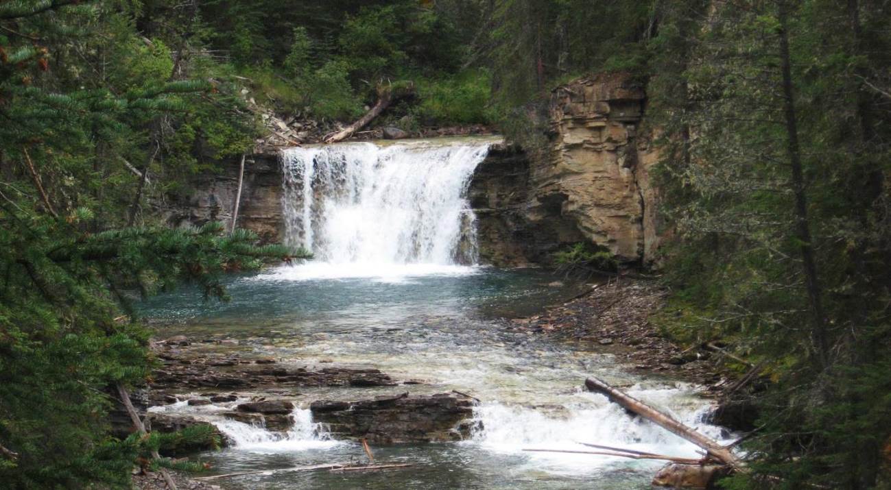 A small waterfall on Johnston Creek in Johnston Canyon, Banff National Park, AB Source: Steven Earle (2015) CC BY 4.0 [view source](https://opentextbc.ca/geology/wp-content/uploads/sites/110/2015/08/Johnston-Creek-.jpg)