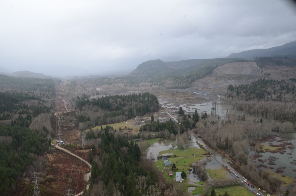 | The Oso landslide, a flow that occurred in Washington State, USA 22 March 2014. Source: Matthew Sissel (2014) Public Domain. [View source](https://www.dvidshub.net/image/1209679/oso-mudslide)