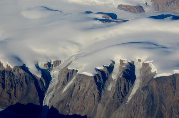 Part of the continental ice sheet in Greenland, with some outflow alpine glaciers in the foreground. _Source: Steven Earle (2015) CC BY 4.0 [view source ](https://opentextbc.ca/geology/wp-content/uploads/sites/110/2015/07/Greenland.jpg)_