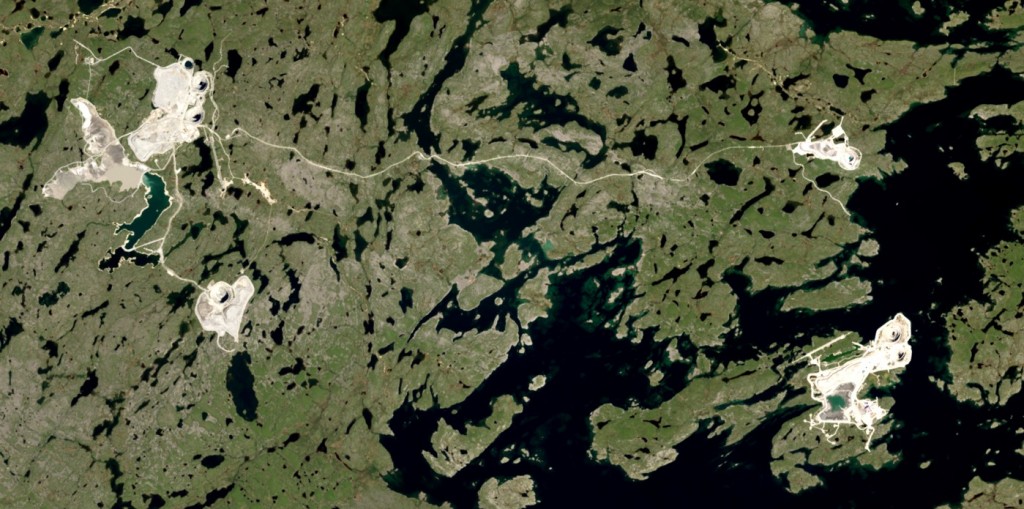 Diamond mines in the Lac de Gras region, Nunavut. The twin pits of the Diavik Mine are visible in the lower right on an island within Lac de Gras. The five pits of the Ekati mine are also visible, on the left and the upper right. The two main mine centres are 25 km apart. [http://earthobservatory.nasa.gov/IOTD/view.php?id=84085&amp;src=eoa-iotd]